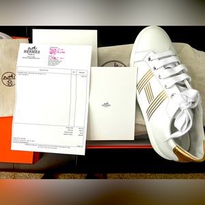 Hermes Sneaker. Model: Avantage Color: White/Gold. Size: 37.5.  Never Used!